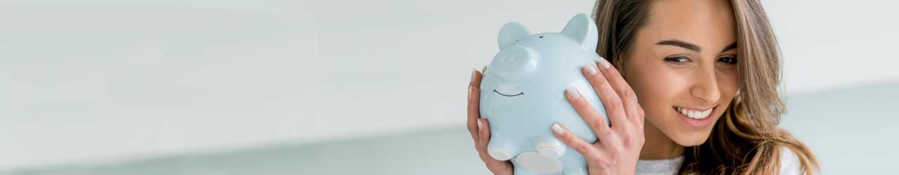 woman holding piggy bank